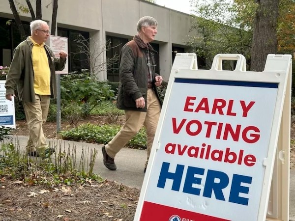 Georgia early voting hits record high on first day as Trump mounts comeback