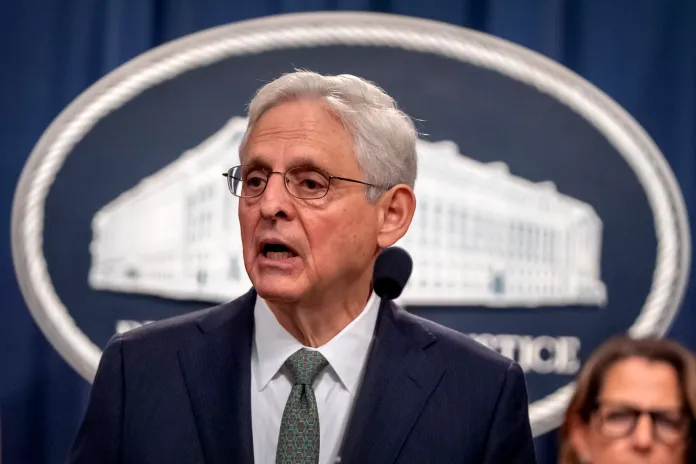 Attorney General Merrick Garland speaks during a news conference at the Department of Justice.