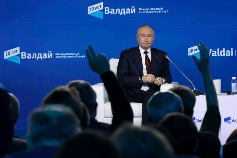 Russian President Vladimir Putin listens to a question during a meeting with foreign policy experts at the Valdai Discussion Club in the Black Sea resort of Sochi, Russia, Thursday, Nov. 7, 2024.