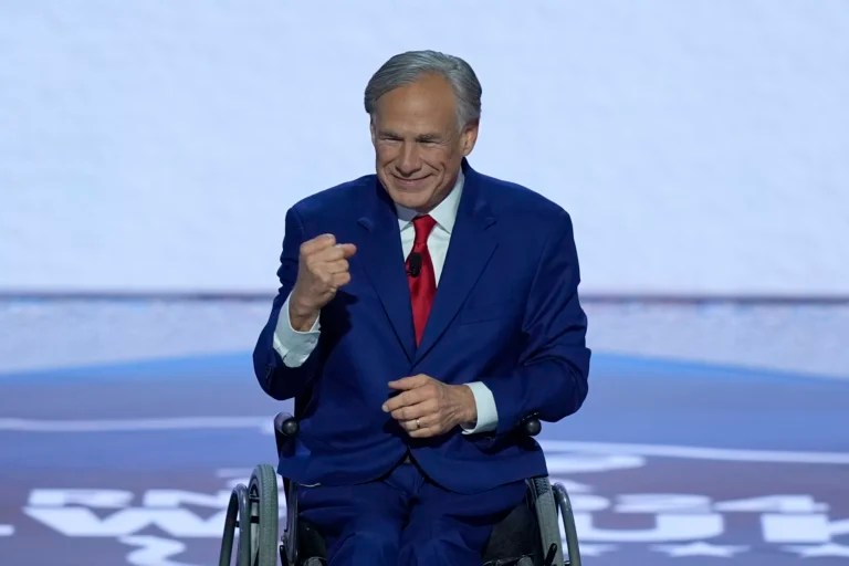 Gov. Greg Abbott (R-TX) gestures to supporters during the Republican National Convention, Wednesday, July 17, 2024, in Milwaukee.