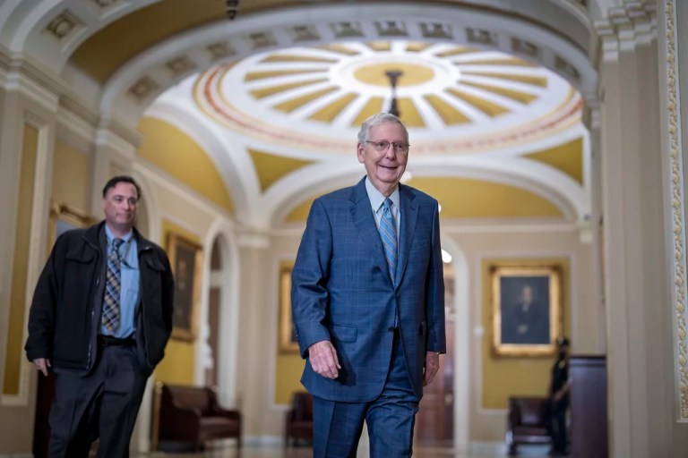 Mitch McConnell being checked by medical team after fall in the Senate
