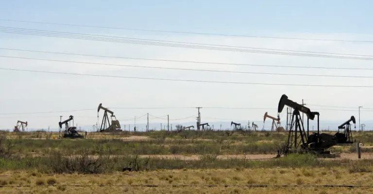 Oil rigs stand in the Loco Hills field