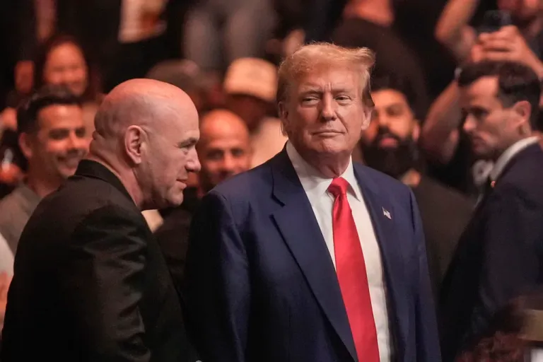Donald Trump, right, talks to Dana White while attending the UFC 302 mixed martial arts event.