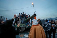 Syrian government falls: Looting and celebrations mark end of over half-century of Assad rule