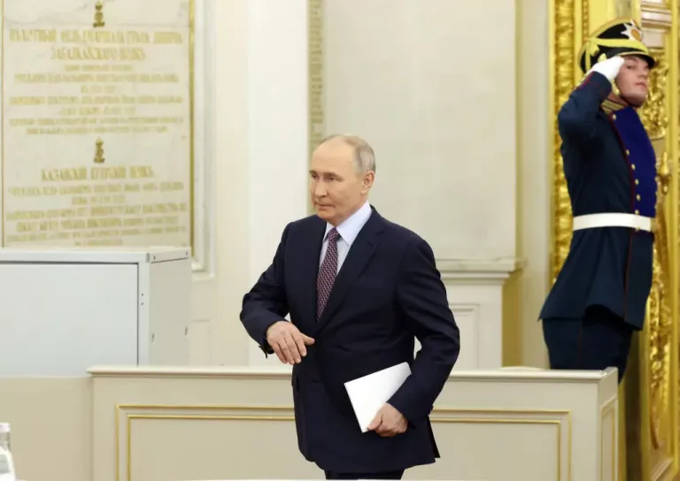 Russian President Vladimir Putin arrives at the Saint George's hall of the Grand Kremlin Palace during the State Council Meeting, December 20, 2024, in Moscow, Russia.