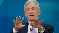 Fed cuts interest rates for third meeting in a row and indicates fewer reductions ahead