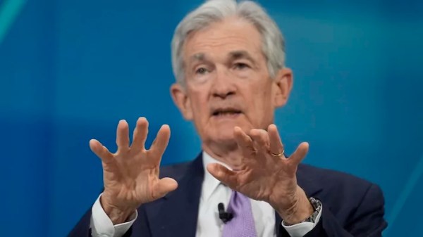 Fed cuts interest rates for third meeting in a row and indicates fewer reductions ahead