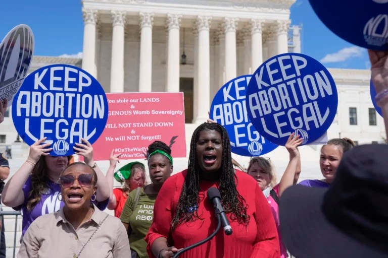Christian F. Nunes, president of the National Organization for Women, speaks as abortion rights activists and Women's March leaders protest as part of a national day of strike actions outside the Supreme Court, Monday, June 24, 2024, in Washington.