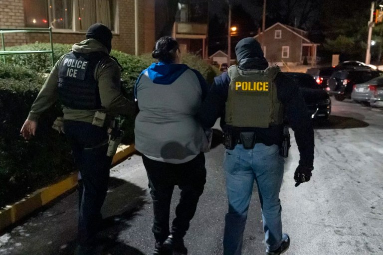 U.S. Immigration and Customs Enforcement officers detain a person, Monday, Jan. 27, 2025, in Silver Spring, Maryland.