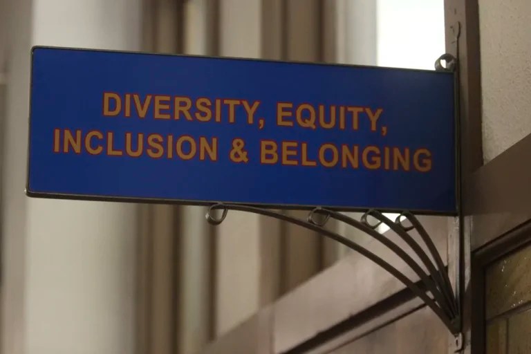 The sign above the door to the Office of Diversity, Equity, Inclusion, and Belonging inside the main administration building on the main University of Kansas campus is pictured, Friday, April 12, 2024, in Lawrence.
