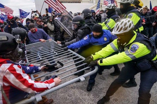 Biden blasts ‘unrelenting effort’ to rewrite history of Jan. 6 riot
