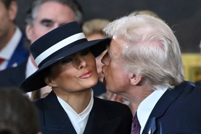 President-elect Donald Trump kisses Melania Trump before the 60th Presidential Inauguration in the Rotunda of the U.S. Capitol in Washington, Monday, Jan. 20, 2025.