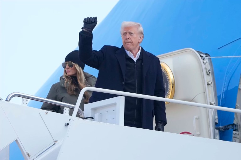 President Donald Trump and first lady Melania Trump board Air Force One, Friday, Jan. 24, 2025, at Joint Base Andrews, Md.