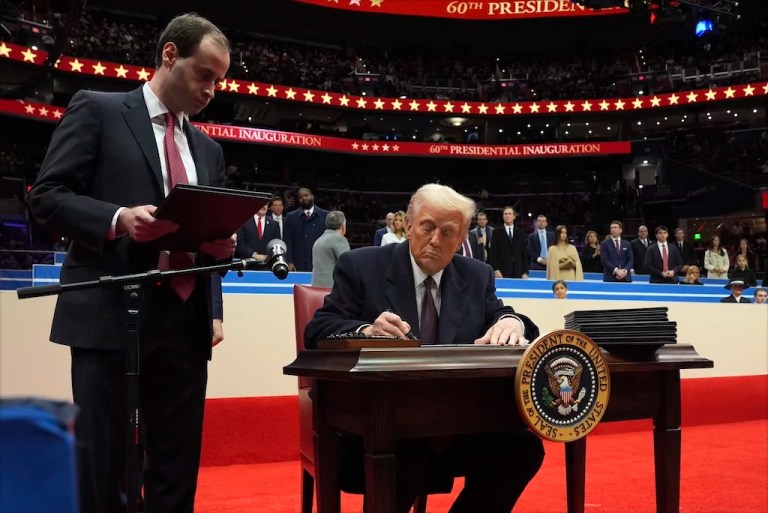 Trump signs first executive orders in party-like atmosphere at Capital One Arena