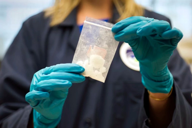 A bag of 4-fluoroisobutyrylfentanyl, seized in a drug raid, is displayed at the Drug Enforcement Administration Special Testing and Research Laboratory in Sterling, Virginia, Aug. 9, 2016.