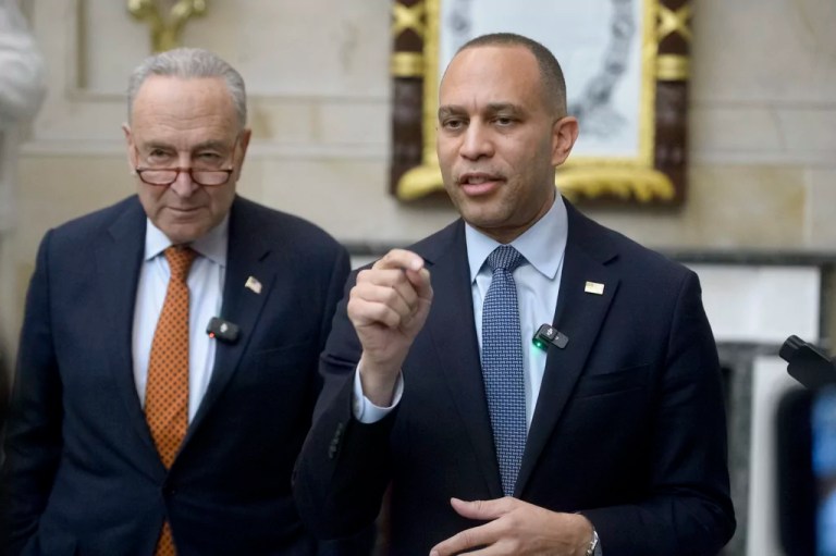 House Minority Leader Hakeem Jeffries (D-N.Y.), right, is joined by Senate Minority Leader Chuck Schumer (D-N.Y.) for a press conference in Statuary Hall at the Capitol, Feb. 12, 2025, in Washington.