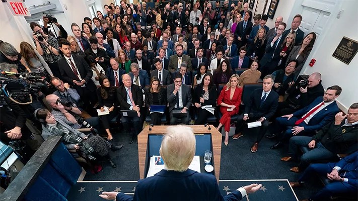 President Donald Trump speaks with reporters in the James Brady Press Briefing Room at the White House, Jan. 30.