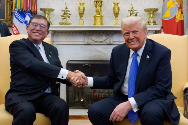 Trump strikes deals with Japanese prime minister as he turns the screw on China