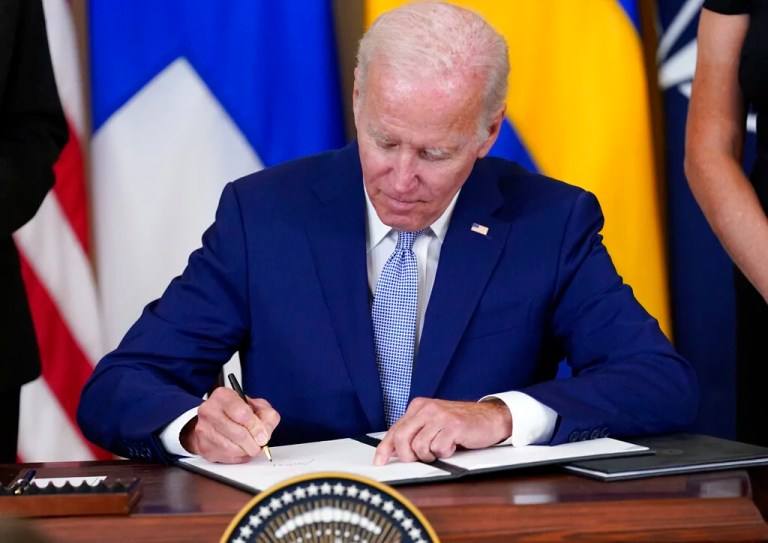 President Joe Biden signs the Instruments of Ratification for the Accession Protocols to the North Atlantic Treaty for the Kingdom of Sweden in the East Room of the White House in Washington, Tuesday, Aug. 9, 2022.