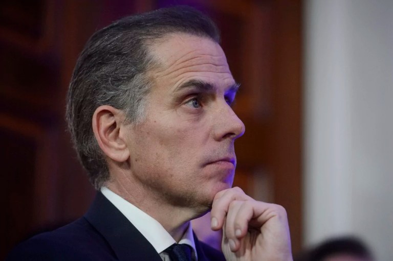 Hunter Biden listens while his father, President Joe Biden, speaks during a Hanukkah reception in the East Room of the White House in Washington, Monday, Dec. 16, 2024.