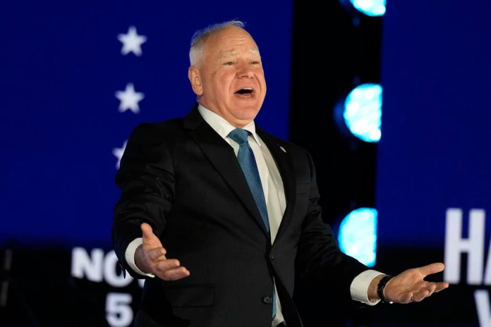 Minnesota Gov. Tim Walz speaking at a campaign rally