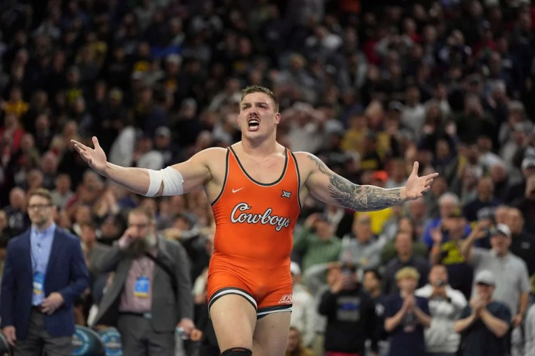 Oklahoma State's Wyatt Hendrickson reacts after defeating Minnesota's Gable Steveson during a 285-pound match in the finals at the NCAA wrestling championship, Saturday, March 22, 2025, in Philadelphia.