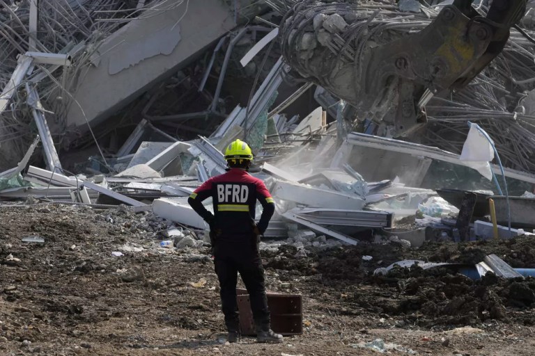 Rescuers work at the site of an under-construction high-rise building that collapsed on Friday after an earthquake in Bangkok, Thailand, Saturday, March 29, 2025.