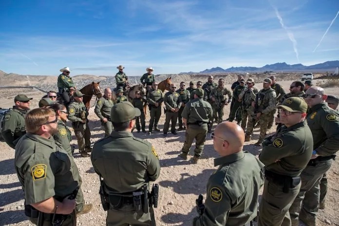 Border Patrol agents wait for the arrival of Defense Secretary Pete Hegseth for a visit to the US-Mexico border in Sunland Park, N.M., Monday, Feb. 3, 2025. (AP Photo/Andres Leighton)