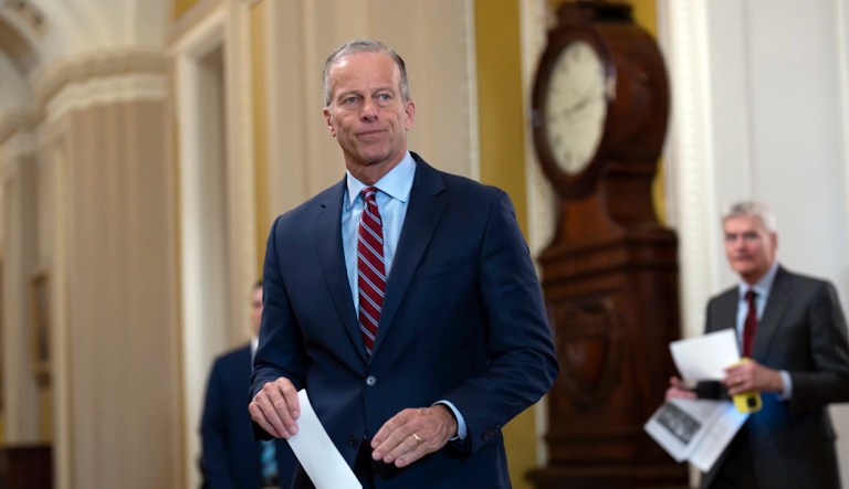 Senate Majority Leader John Thune (R-SD) arrives to speak to reporters as Republicans work to pass an interim spending bill that would avoid a partial government shutdown and keep federal agencies funded through September at the Capitol in Washington, Tuesday, March 11, 2025.