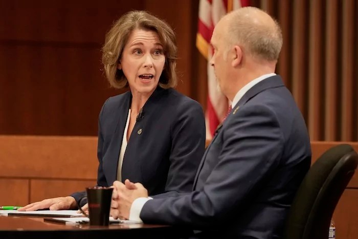 Wisconsin Supreme Court candidates Brad Schimel and Susan Crawford participate in a debate Wednesday, March 12, 2025, in Milwaukee.