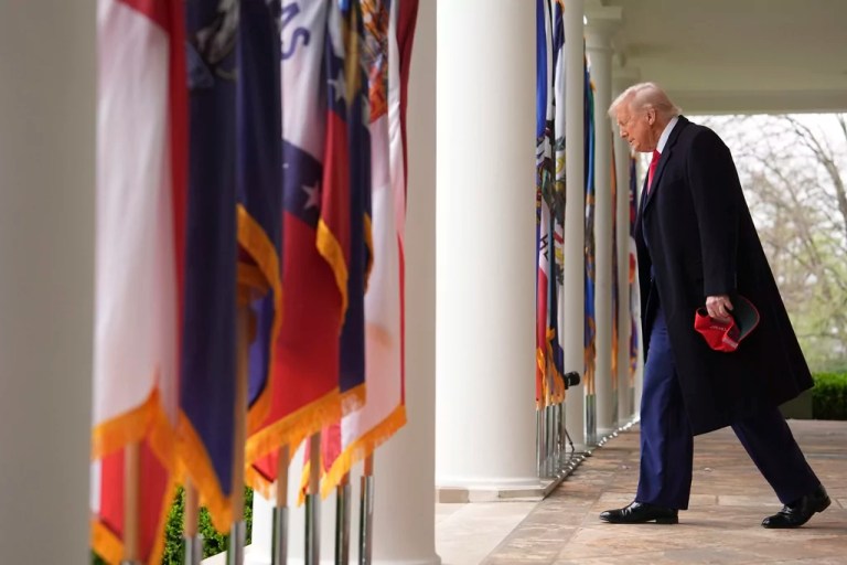 President Donald Trump arrives to speak during an event to announce new tariffs in the Rose