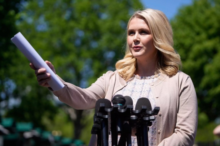 White House press secretary Karoline Leavitt speaks with reporters outside the White House, Wednesday, April 23, 2025, in Washington.