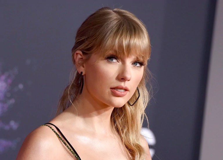 This Nov. 24, 2019 file photo shows Taylor Swift at the American Music Awards in Los Angeles. Swift announced online that she’s dropping the first of her re-recorded albums. She said “Fearless: Taylor’s Version” features re-recorded songs from her sophomore album, “Fearless.” The new set will also contain six never-before released songs. Swift will also release a new version of her song “Love Story” from “Fearless” on Thursday at midnight.