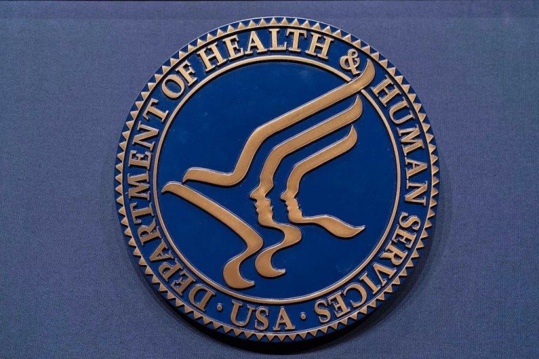 The Health and Human Services seal is seen before the news conference of Secretary Robert F. Kennedy Jr. at the Hubert Humphrey Building Auditorium in Washington, Wednesday, April 16, 2025.