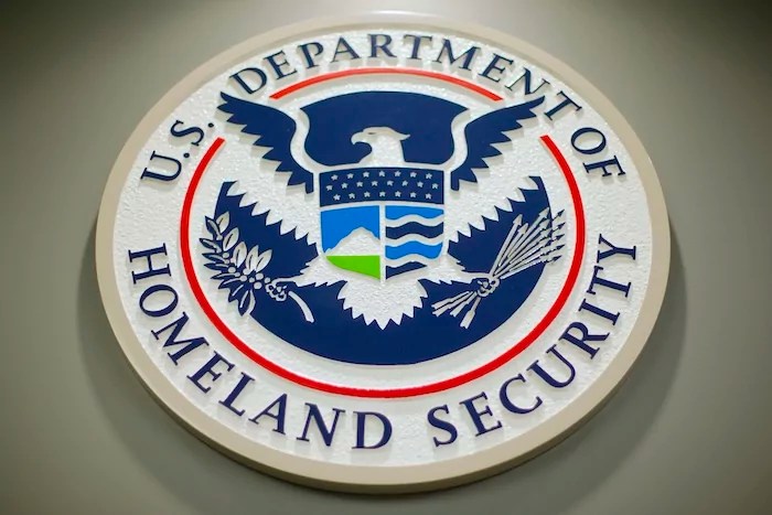The Department of Homeland Security logo is seen during a news conference in Washington, Feb. 25, 2015.