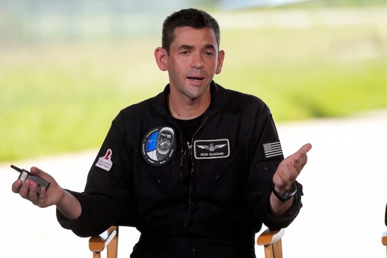 Commander Jared Isaacman speaks at a news conference after arriving at the Kennedy Space Center for an upcoming private human spaceflight mission in Cape Canaveral, Florida, Aug. 19, 2024.
