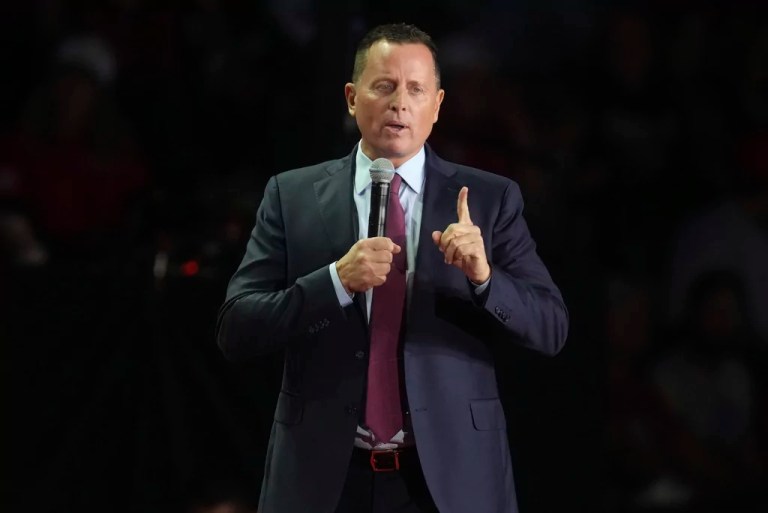 Ric Grenell, former acting Director of National Intelligence, speaks before President Donald Trump arrives at a campaign rally at Van Andel Arena, Monday, Nov. 4, 2024, in Grand Rapids, Michigan.