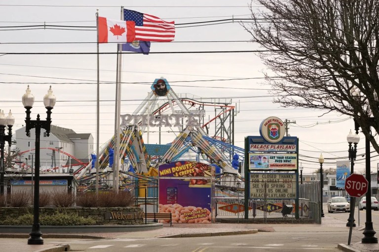 American and Canadian flags fly near the Palace Playland amusement park.