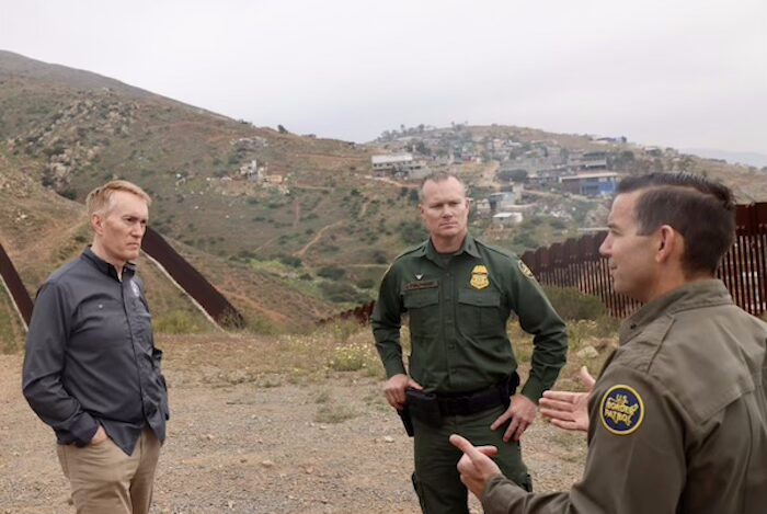 Sen. James Lankford (R-OK) speaks with two Border Patrol agents in San Diego, CA, during a trip in early May 2025. (Courtesy image provided by Lankford's office)