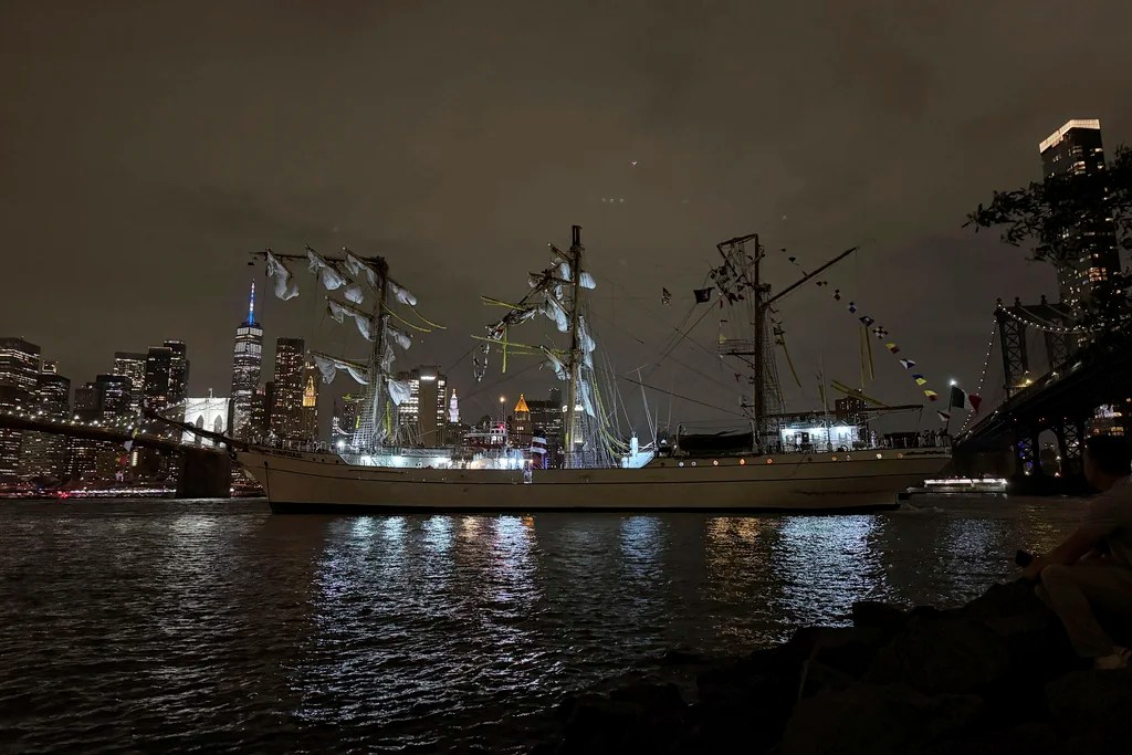 A masted Mexican Navy training ship, the Cuauhtémoc, sits stranded after colliding with the Brooklyn Bridge after, Saturday, May 17, 2025, in New York. 