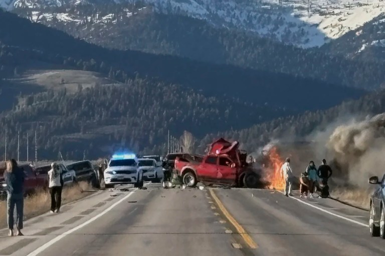 Rescue workers arrive to the scene after a deadly collision between a pickup truck and tour van near Henry’s Lake State Park in eastern Idaho on Thursday, May 1, 2025.