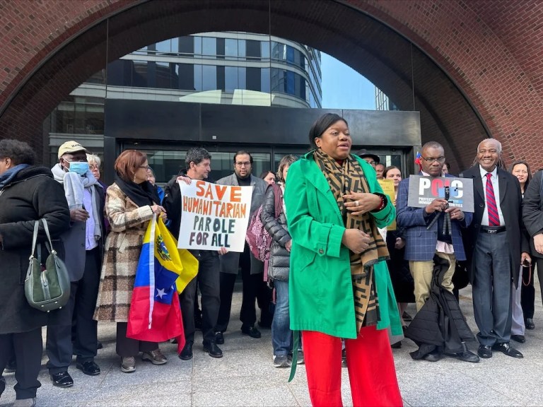 Immigration advocates speak outside a federal court in Boston, Thursday, April 10, 2025, after a hearing aiming to halt the Trump administration's from stopping a program that allowed hundreds of thousands of Cubans, Haitians, Nicaraguans, and Venezuelans to temporarily live in the country. (AP Photos/Michael Casey)
