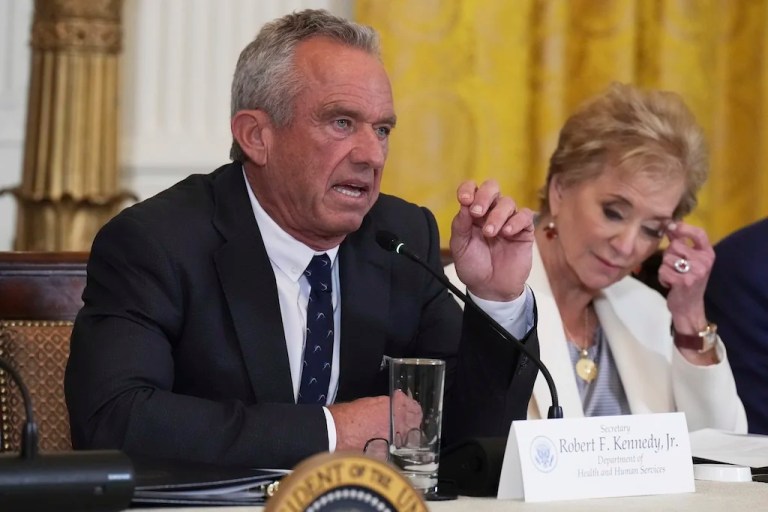 Health and Human Services Secretary Robert F. Kennedy Jr. speaks as Education Secretary Linda McMahon listens during a Make America Healthy Again Commission Event in the East Room of the White House, Thursday, May 22, 2025, in Washington.