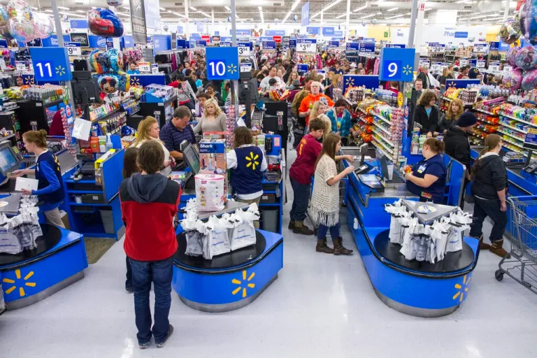 IMAGE DISTRIBUTED FOR WALMART - Customers wrap up their holiday shopping during Walmart's Black Friday events on Thursday, Nov. 27, 2014 in Bentonville, Ark. Deep savings continue at Walmart Friday though Cyber Monday as part of five days of events in stores and online. (Photo by Gunnar Rathbun/Invision for Walmart/AP Images)