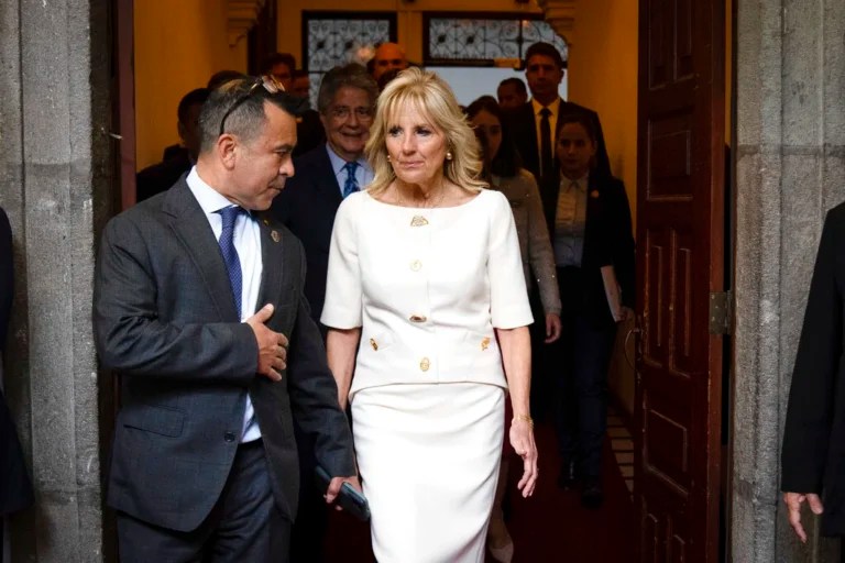 First lady Jill Biden talks with senior adviser Anthony Bernal before her speech at the Carondelet Palace in Quito, Ecuador, Thursday, May 19, 2022.