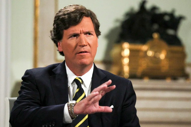 In this photo released by Sputnik news agency on Friday, Feb. 9, 2024, former Fox News host Tucker Carlson gestures during an interview with Russian President Vladimir Putin, at the Kremlin in Moscow, Russia, Tuesday, Feb. 6, 2024
