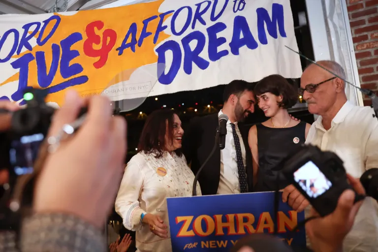 Democratic mayoral candidate Zohran Mamdani, center right, appears on stage with his family including his mother, Mira Nair, left, his wife, Rama Duwaji, and father, Mahmood Mamdani, right, at his primary election party, Wednesday, June 25, 2025, in New York.