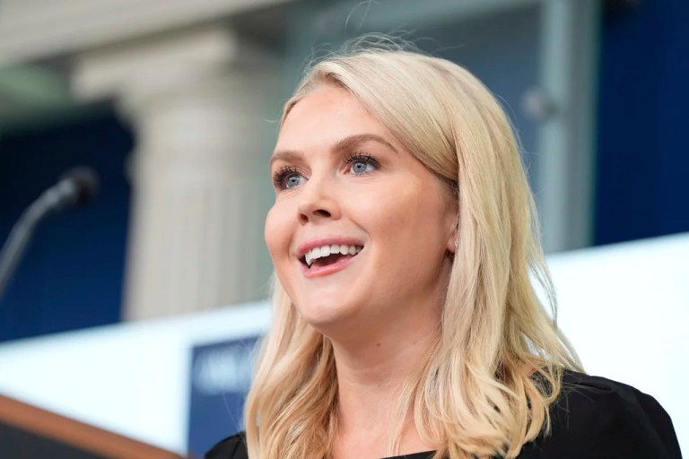 White House press secretary Karoline Leavitt smiles as she speaks with reporters in the James Brady Press Briefing Room at the White House.