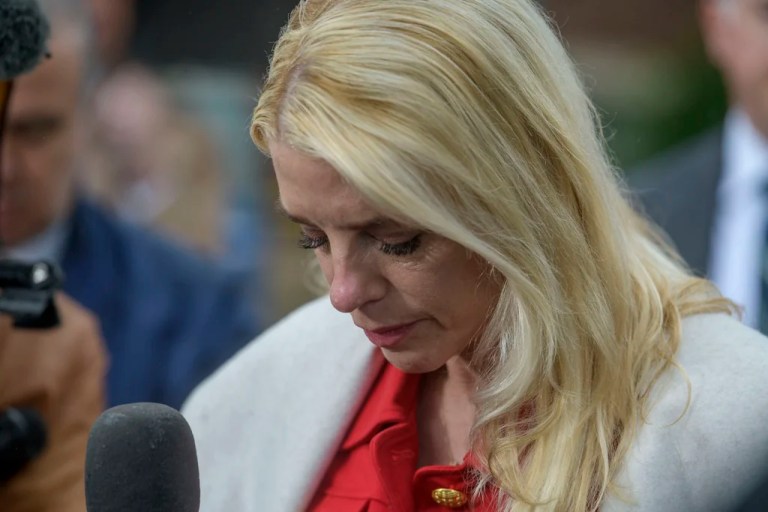 Attorney General Pam Bondi talks with reporters as law enforcement work the scene after two staff members of the Israeli Embassy in Washington were shot and killed outside the Capital Jewish Museum, Thursday, May 22, 2025, in Washington.