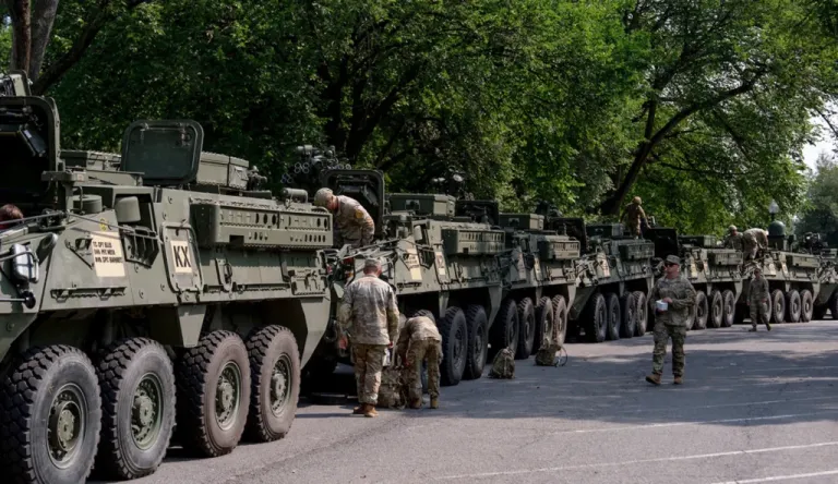 U.S. Army soldiers work on Stryker combat vehicles staged in West Potomac Park.